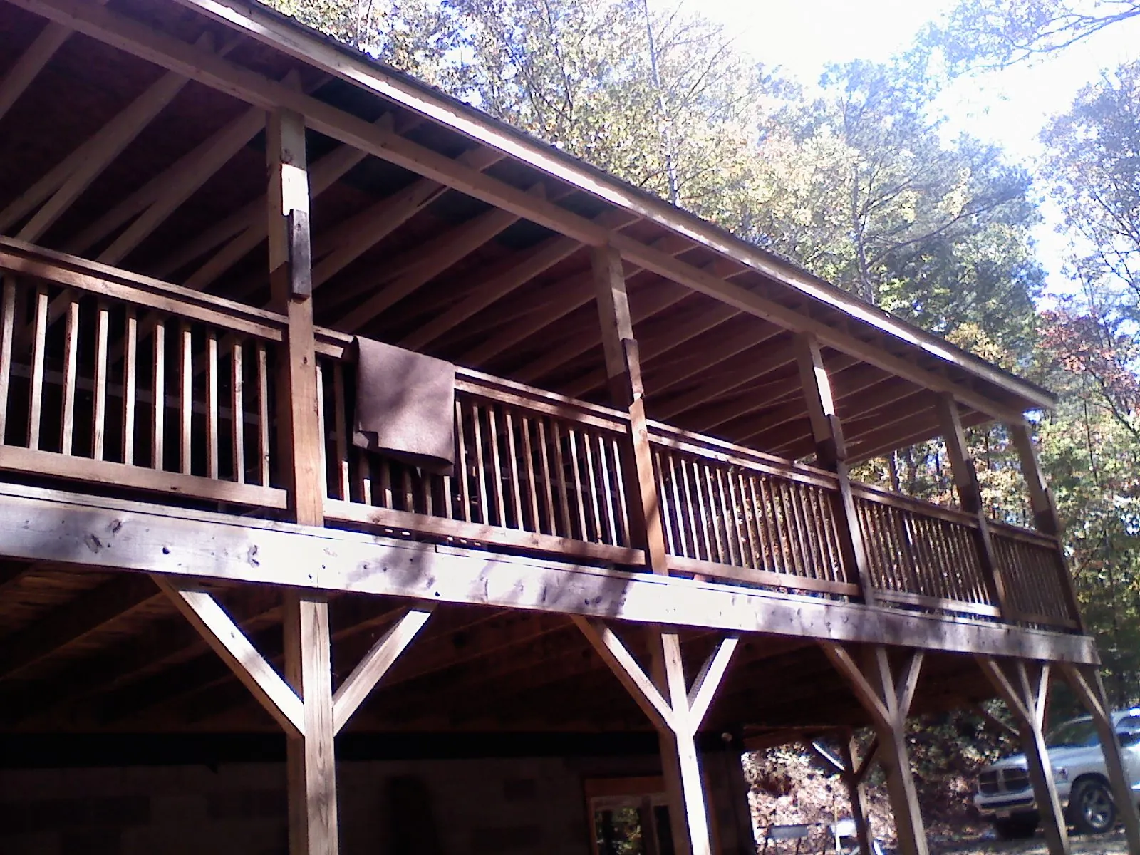 Timber framing under a new elevated porch and deck — Roof Leak Repair in Seminole by Roofing Brothers
